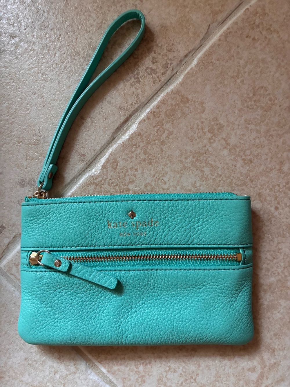 kate spade turquoise leather wristlet with gold hardware